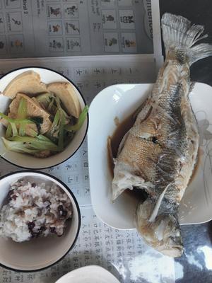 Steamed bass with red bean rice and crispy tofu.