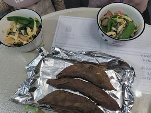 Baked sweet potatoes with a mixed vegetable salad.