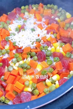 For the vegetable rice, mix in peas, corn, carrots, and Chinese sausage into the rice.