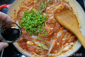 Add the chopped fresh herbs and light soy sauce.