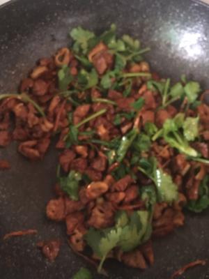 Finally, add the cilantro and stir-fry until just wilted before turning off the heat.