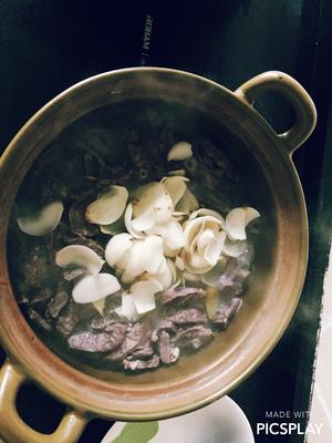 Add the fresh lotus root and bring it back to a boil.