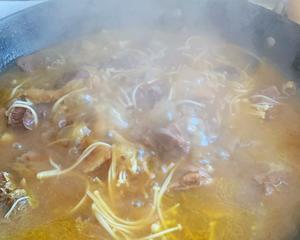 After the pressure cooking, return the chicken and broth to a large pot. About ten minutes before it's done, add the mushrooms. The kids love the seasoned mushrooms.