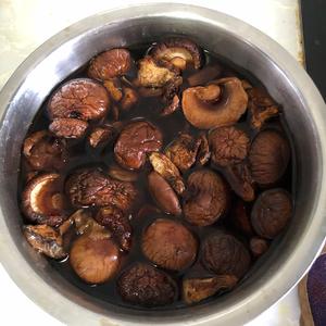 Soak the mushrooms in warm water ahead of time. If you're in a hurry, you can use warm water with vinegar and baking soda to quickly soak them.