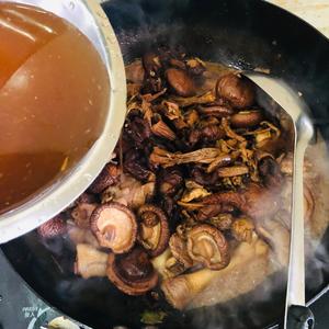 Add the mushrooms and pour in the soaked mushroom water.