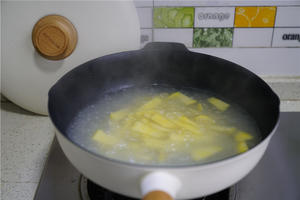 Cook until the sweet potatoes are fully cooked, then gently cut them open.