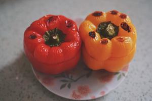 Bake until the surface of the bell peppers is charred.