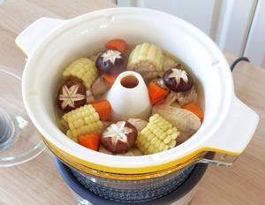 Add mushrooms and carrots to continue steaming for an additional hour.