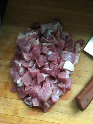 Clean and cut the pork into chunks.