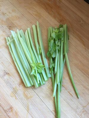 Wash and chop the celery into sections.