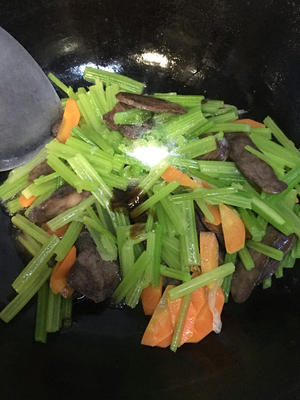 Add salt, light soy sauce, and oyster sauce, and stir-fry evenly.