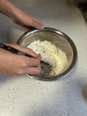 Mix an appropriate amount of flour with slightly more than half its weight in water, stirring until crumbly.