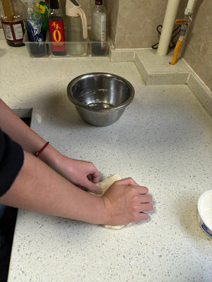 Knead the mixture into a smooth dough and cover it to rest.