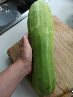 Prepare a large zucchini. You can leave the skin on; I peeled it because mine was a bit old, and I also removed the old seeds.